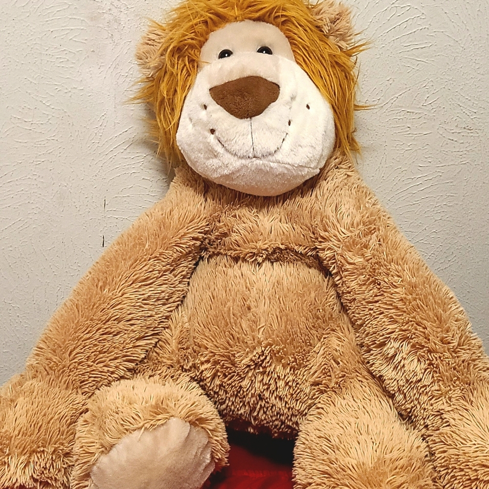 Lion stuffed animal by hug fun